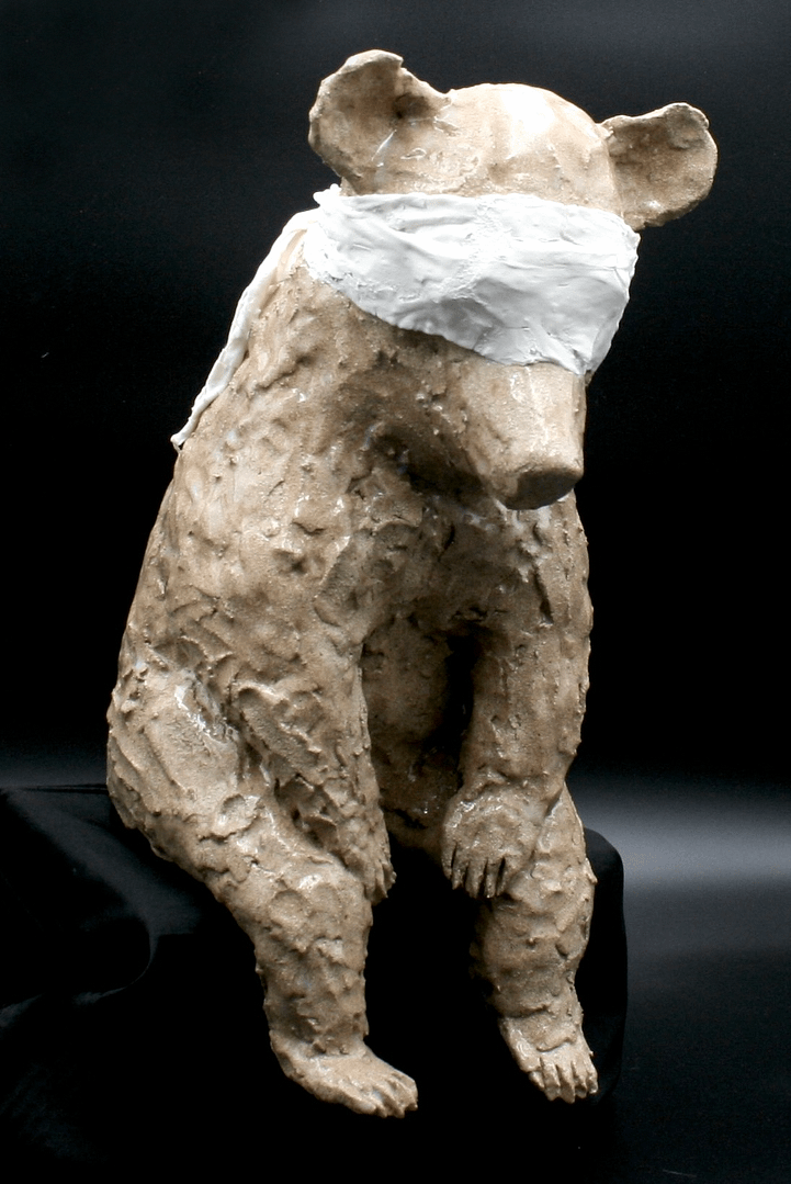 Clara Lundgrens ceramic sculpture depicts a seated blindfolded bear